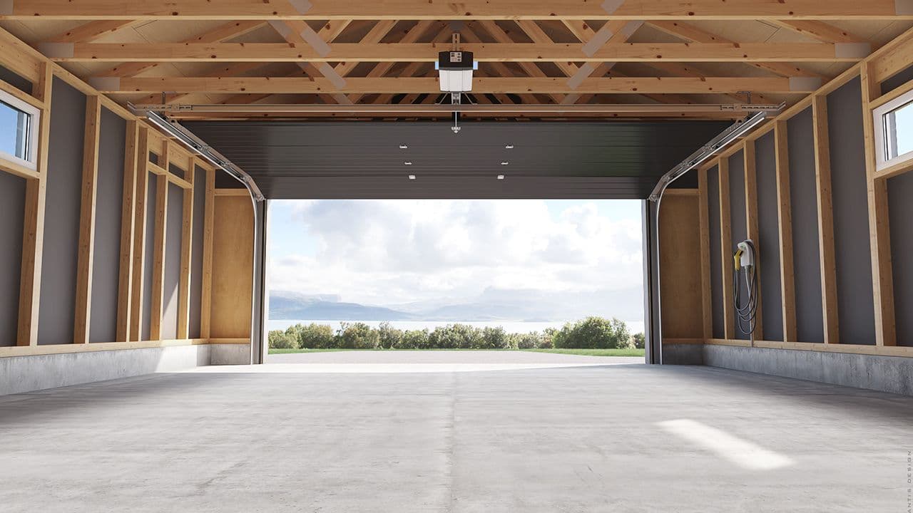 Garasjegulv i betong i garasje som står åpen.