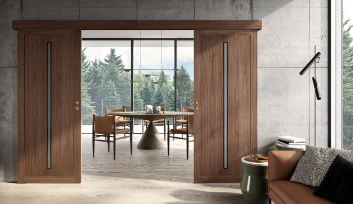 industrielt designet bolig med utenpåliggende skyvedører i eik fra Swedoor